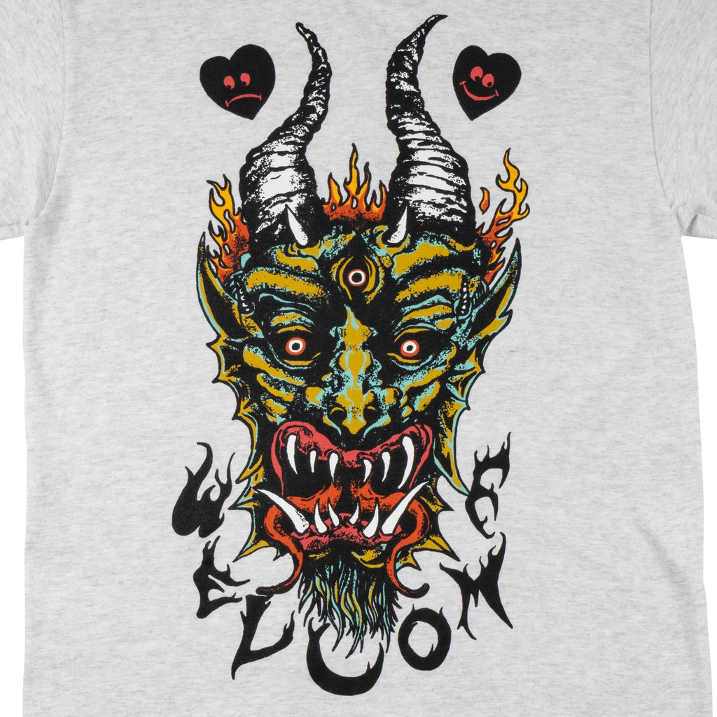 A Welcome Light and Easy Tee Ash Heather with an image of a demon with horns and flames.