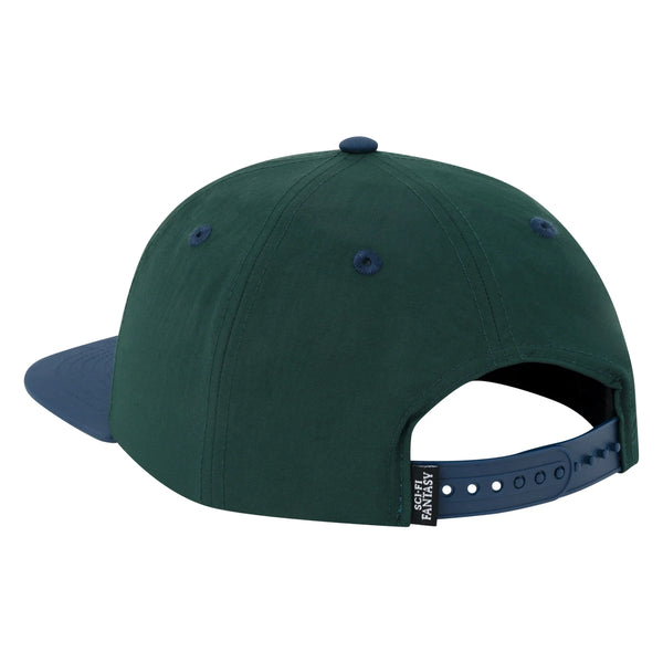 The back of the hat that features a navy, plastic snap-back closure.