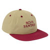 A khaki colored hat with a dark red bill and dark red details, including the logo on across the front.