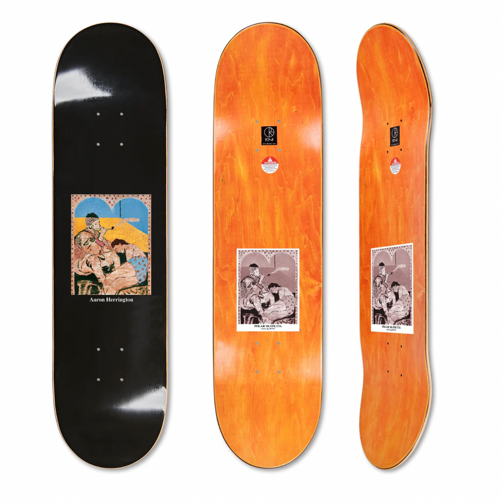A couple of POLAR HERRINGTON DAY DREAMING skateboards sitting next to each other.