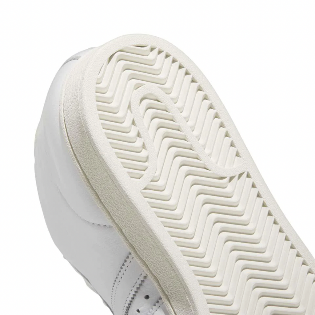 A pair of white ADIDAS SAM NARVAEZ PRO MODEL ADV sneakers with a white sole.