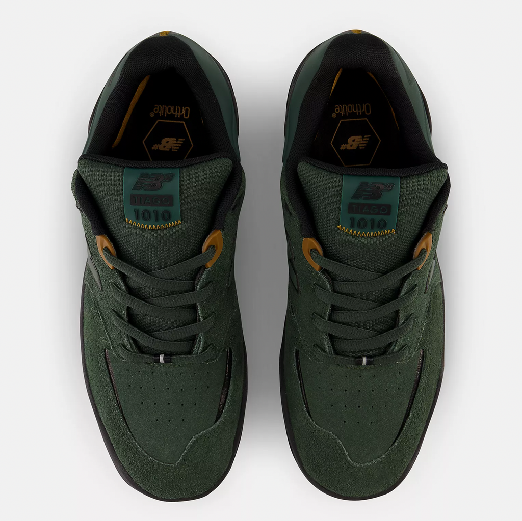 A pair of NB NUMERIC 1010 Tiago Green/Black sneakers on a white background.
