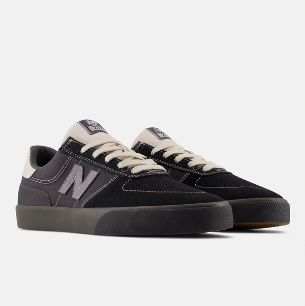 A black and grey NB NUMERIC 272 sneaker with a white sole.