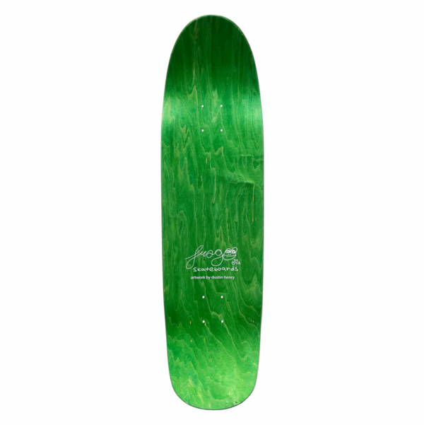 The top of a deck with green stain and white text that says frog skateboards.