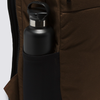 A water bottle modeling in the black mesh, side pocket of the brown backpack.