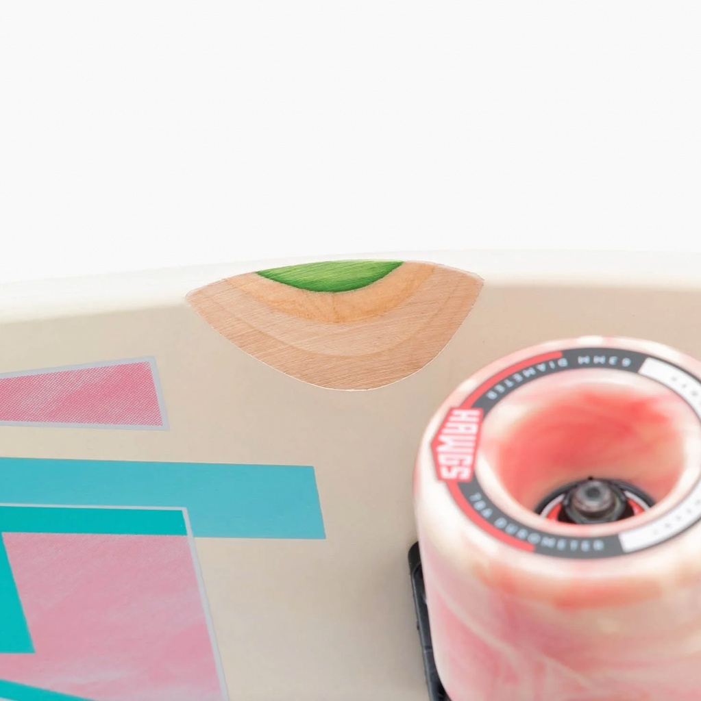 A LANDYACHTZ TONY DANZA WATERCOLOR LONGBOARD with a pink and blue design on it.