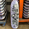 A STRANGELOVE GOTH PUPPET skateboard with glow in the dark artwork by Sean Cliver, inside a warehouse.