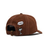 The Butter Goods BUTTER X PEANUTS SPIKE 5 PANEL CAP in brown and light pink is a cotton twill cap with white stitching, featuring an embroidered cartoon character and a "SIGH" speech bubble on the back.