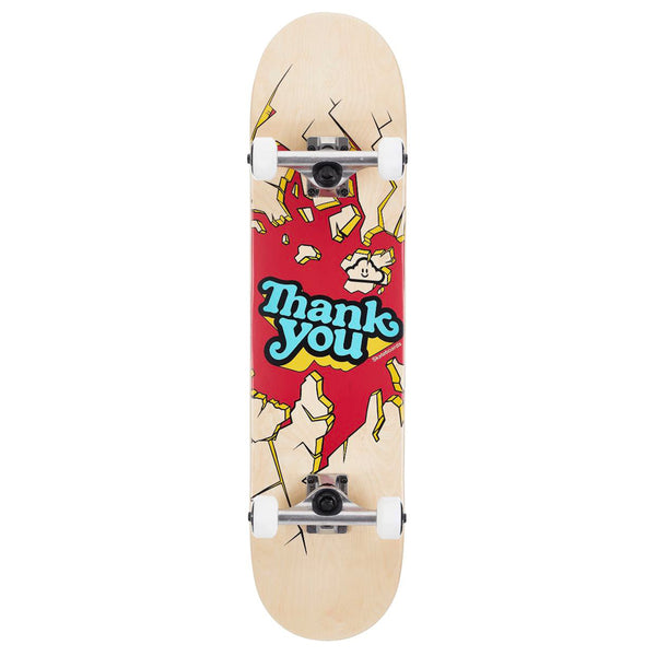 A THANK YOU BREAKTHROUGH COMPLETE skateboard with a colorful graphic design featuring the phrase "thank you" and the word "BREAKTHROUGH" on its underside.