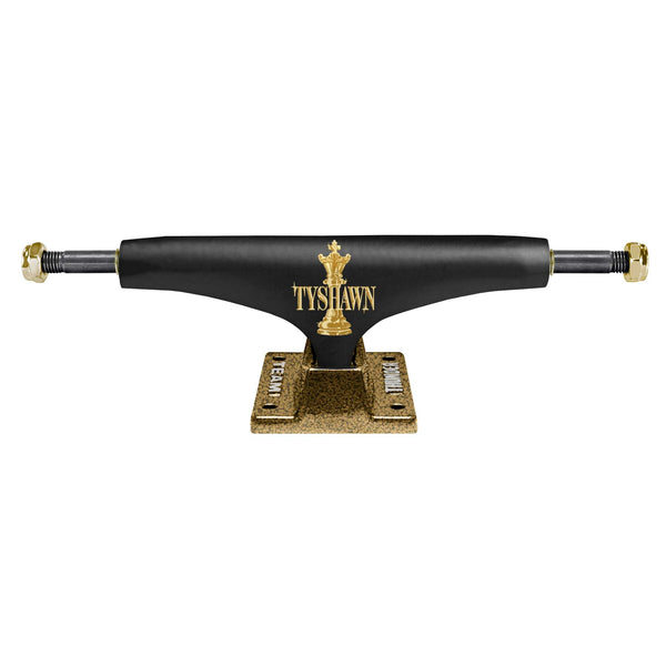 A front view of the THUNDER TRUCKS TYSHAWN PRO ENDGAME 148 (SET OF TWO) skateboard trucks in black and gold, featuring an 8.25" axle and "TYSHAWN" printed in gold on the hanger.