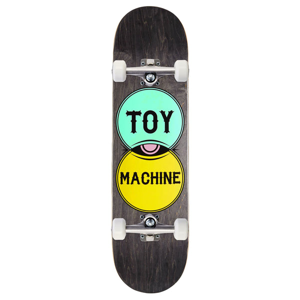 A complete skateboard with TOY MACHINE VENNDIAGRAM COMPLETE graphics on the underside.