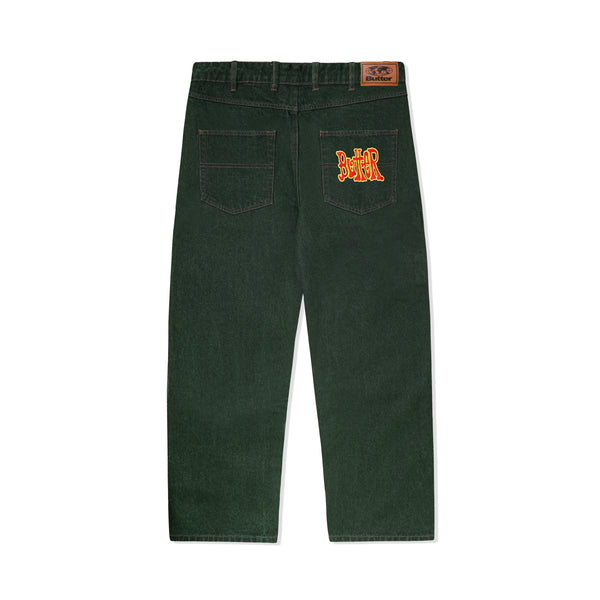 A pair of BUTTER GOODS TOUR DENIM JEANS ARMY WASH with an orange logo on them, featuring the Army Wash, by Butter Goods.