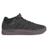 A black and red ADIDAS TYSHAWN CARBON / CORE BLACK / PRELOVED BROWN shoe with a red stripe.
