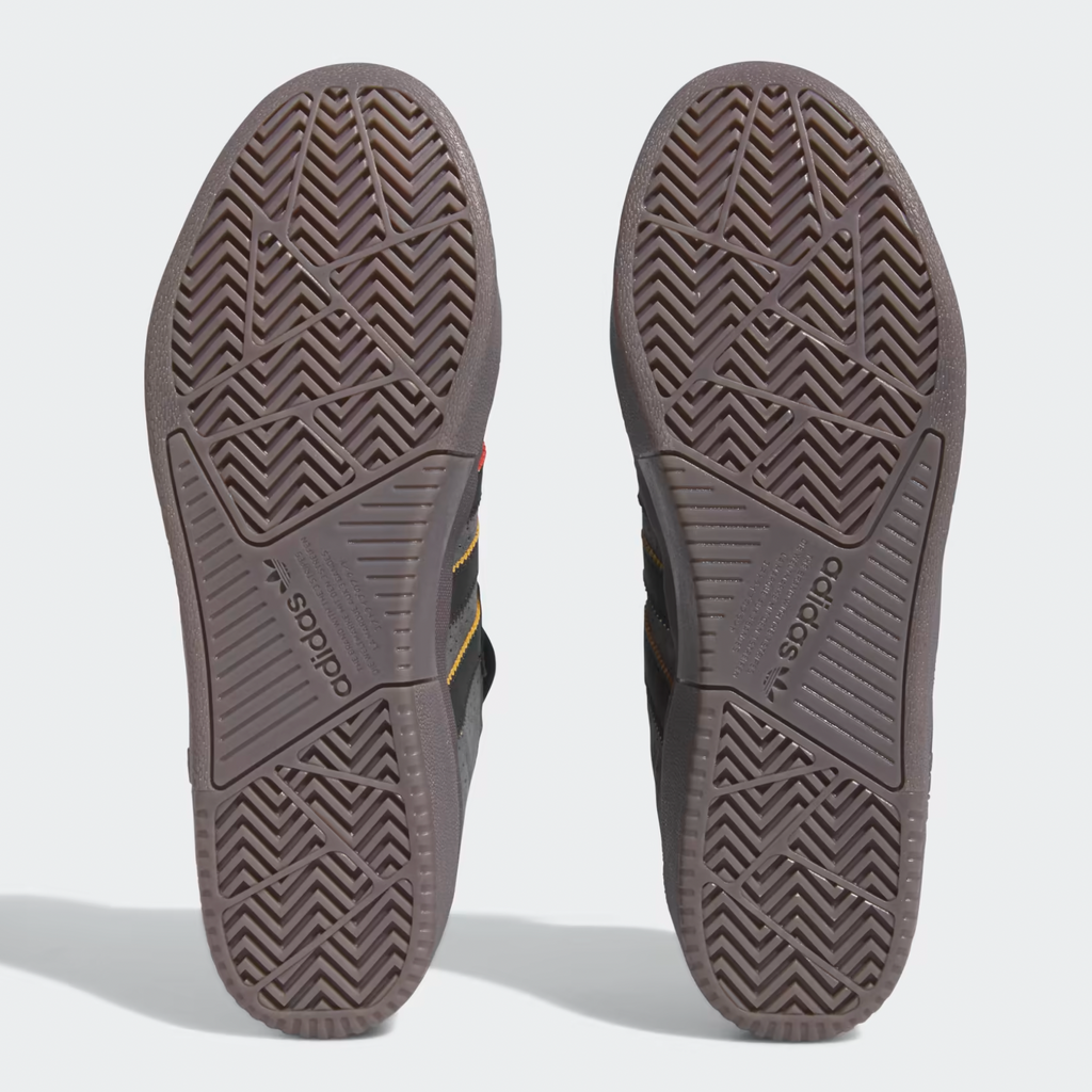 A pair of ADIDAS TYSHAWN CARBON / CORE BLACK / PRELOVED BROWN sneakers on a white background.