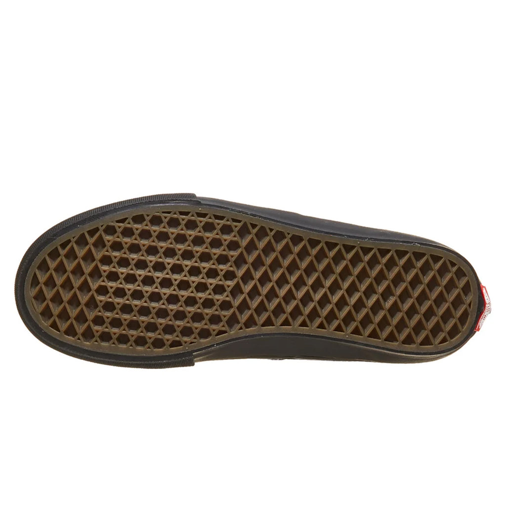 The bottom view of the shoe with a gum waffle bottom sole.