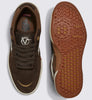 A pair of brown skate shoes with white soles featuring VANS ROWAN 2 CHOCOLATE BROWN design.