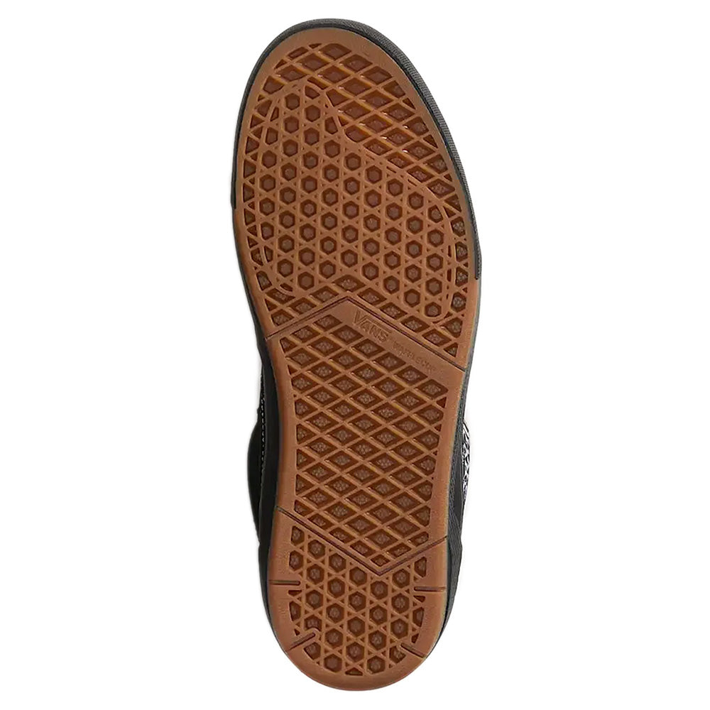 The image shows the brown Wafflecup outsole with a waffle pattern on the bottom of the VANS SKATE HALF CAB WAFFLE CUP BLACK / ASPHALT shoe by VANS.