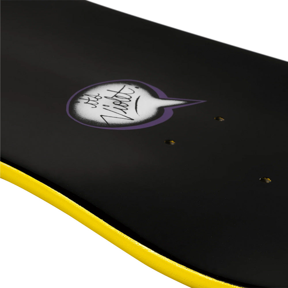 A close-up of the violet VIOLET BOY WITH BALLOON skateboard featuring a black top, yellow edges, a “the Violet” speech bubble graphic, and an 8.25" wheelbase.
