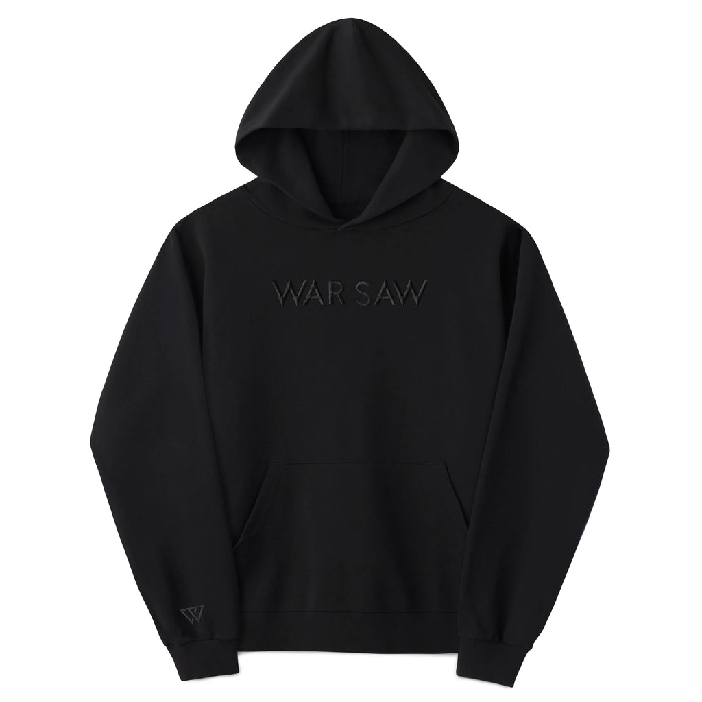 The WAR SAW UNKNOWN HOODIE BLACK by WAR SAW is garment-dyed with "WARSAW" on the front, a front pocket, oversized unisex fit, and a "W" logo on the sleeve.