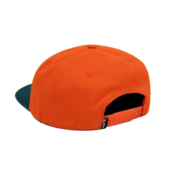 A WKND orange snapback hat.