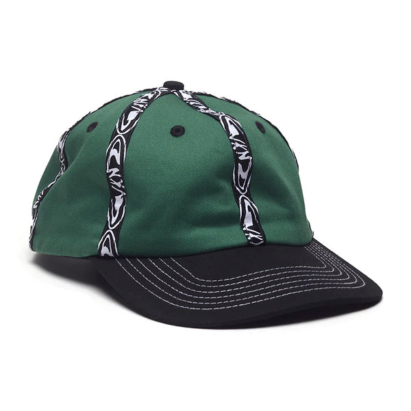 The WKND INSIDE OUT HAT GREEN by WKND is a green cotton hat with a black brim, white stitched details, and black and white fishbone woven tape stripes on the crown.