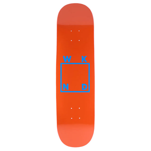 The WKND LOGO ORANGE BLUE skateboard deck features an orange shovel nose and a blue-outlined square with W, K, N, D at each corner, inspired by the Jordan Taylor Pro Model.