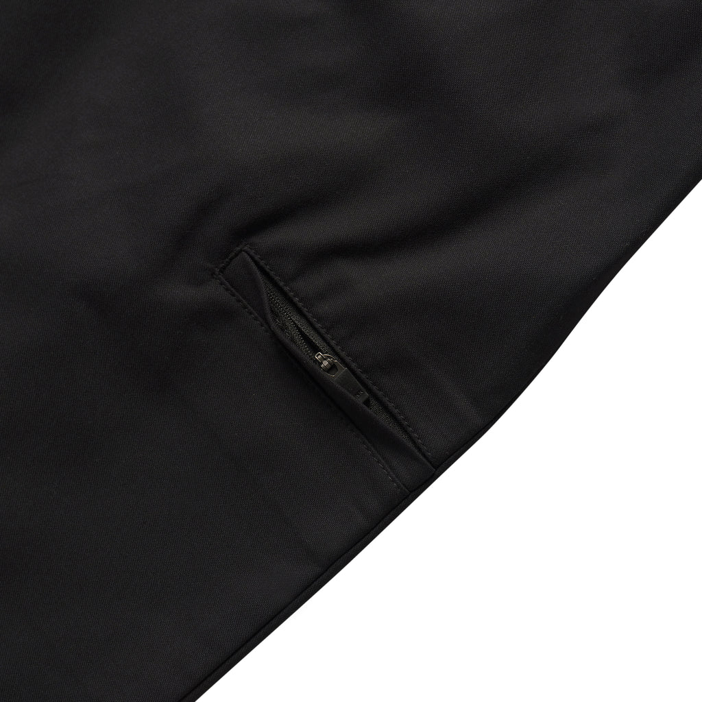 A close up of black DICKIES TOM KNOX twill work pants.