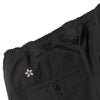 A pair of DICKIES TOM KNOX TWILL WORK PANT BLACK shorts with a flower on the pocket from DICKIES.