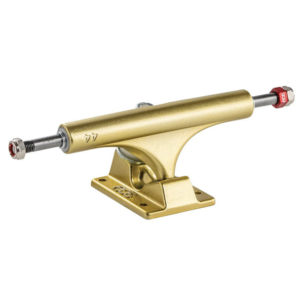 A gold skateboard truck with a red bolt at the end, featuring a baseplate and axle designed for mounting to a skateboard deck. Made from AA 356.2 alloy, the ACE AF1 44 GOLD (SET OF TWO) by Ace includes rethreading axle nuts for easy maintenance and durability.