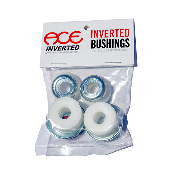 A package of Ace MFG INVERTED BUSHINGS WHITE by Ace, includes four metal washers and two white inverted bushings for skateboard trucks.