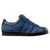 The ADIDAS X ARROW & BEAST SUPERSTAR ADV NIGHT MARINE / CORE BLACK is a blue textured skate shoe with a black sole and toe cap, three signature stripes, lace-up closure, and a durable cupsole construction.