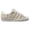 The ADIDAS x ARROW & BEAST SUPERSTAR ADV in Wonder White/Crystal White features a textured woven design, classic three stripes, white laces, and durable cupsole construction for lasting comfort and style.
