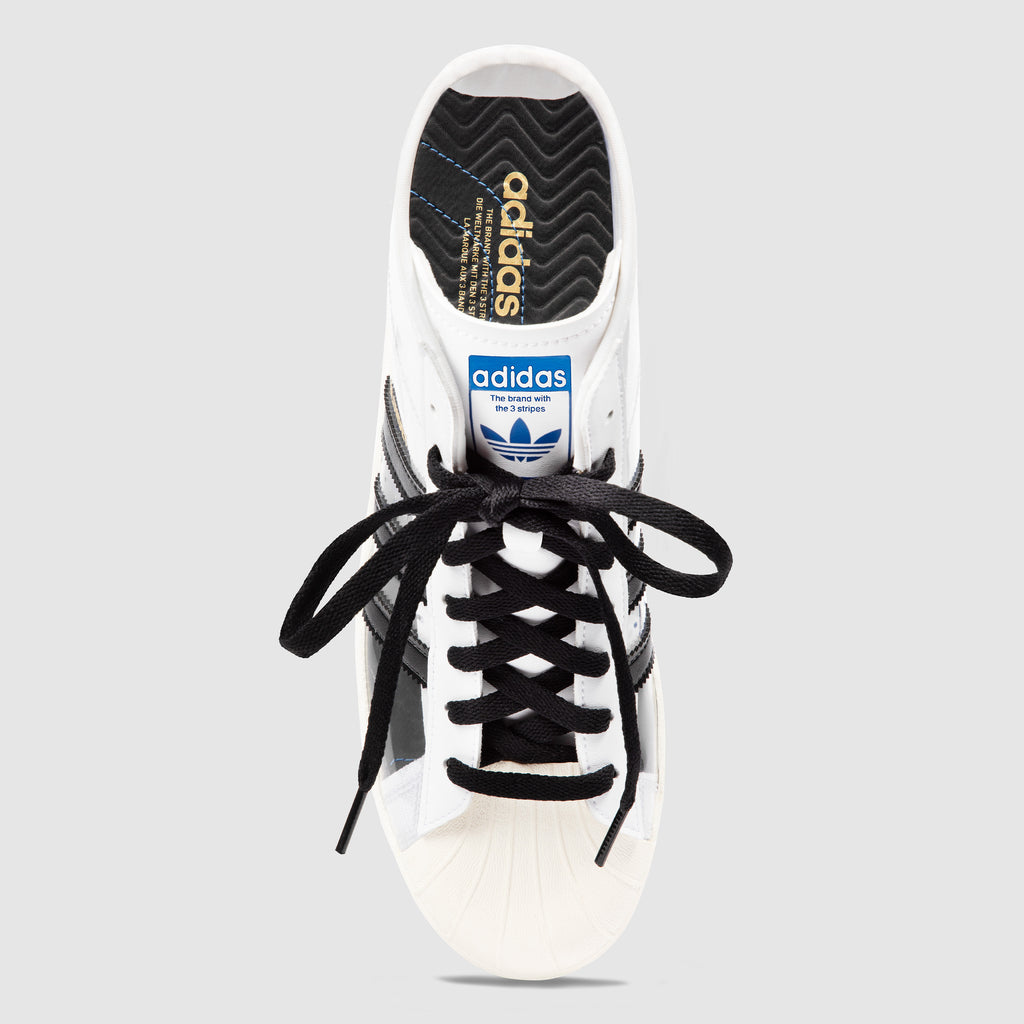 A pair of ADIDAS BLONDEY PRO MODEL WHITE sneakers with laces.