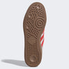 The ADIDAS Busenitz Bliss / Better Scarlet / Gum features a brown rubber sole with geometric patterns, circular shapes, and an Adidas logo near the heel, plus cushioned cupsole construction for comfort.
