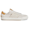 The ADIDAS NORA ALUMINUM / WHITE / GOLD shoe features a modern cupsole design, white sole, tan heel detail, gold "NORA" text on the side, and ADIDAS's signature three stripes.