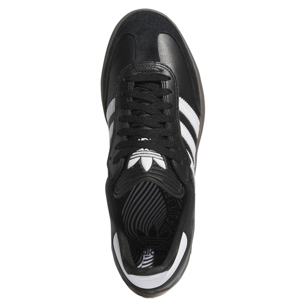 Top view of the ADIDAS PUIG SAMBA ADV in Core Black, featuring white stripes, black laces, and white branding on the tongue and sole, epitomizing the classic style of ADIDAS skateboarding shoes.