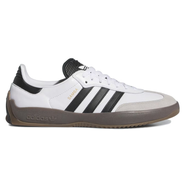 A side view of the ADIDAS PUIG SAMBA ADV CLOUD WHITE / CORE BLACK / GUM shoe. The shoe features a white leather upper, black three-stripe branding, and a gum sole. The word "Samba" is written in gold on the side. Ideal for skateboarding enthusiasts, it also boasts a cushioned EVA midsole for enhanced comfort and performance.