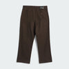 Image of dark brown ADIDAS SKATEBOARDING KADER PANT viewed from the back, featuring two back pockets and a small label on the upper right side, showcasing 100% cotton denim for durability.