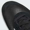 Close-up of ADIDAS TYSHAWN 2 showcasing CORE BLACK sneakers with a perforated leather upper, suede accents, black laces, and a CLOUD WHITE sole.