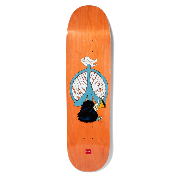 A CHOCOLATE skateboard with an image of a dog on it.