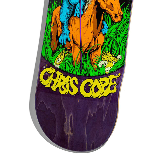 The GRIMPLE STIX CHRIS COPE GUEST BOARD CUSTOM SHAPE from ANTIHERO features a skateboard deck adorned with vibrant artwork of a person riding an orange horse through lush green foliage. The name "CHRIS COPE" is prominently displayed at the bottom in bold yellow text. Designed with a unique twin-nose shape, this board perfectly embodies the spirit of GERWER ASPHALT ANIMALS.