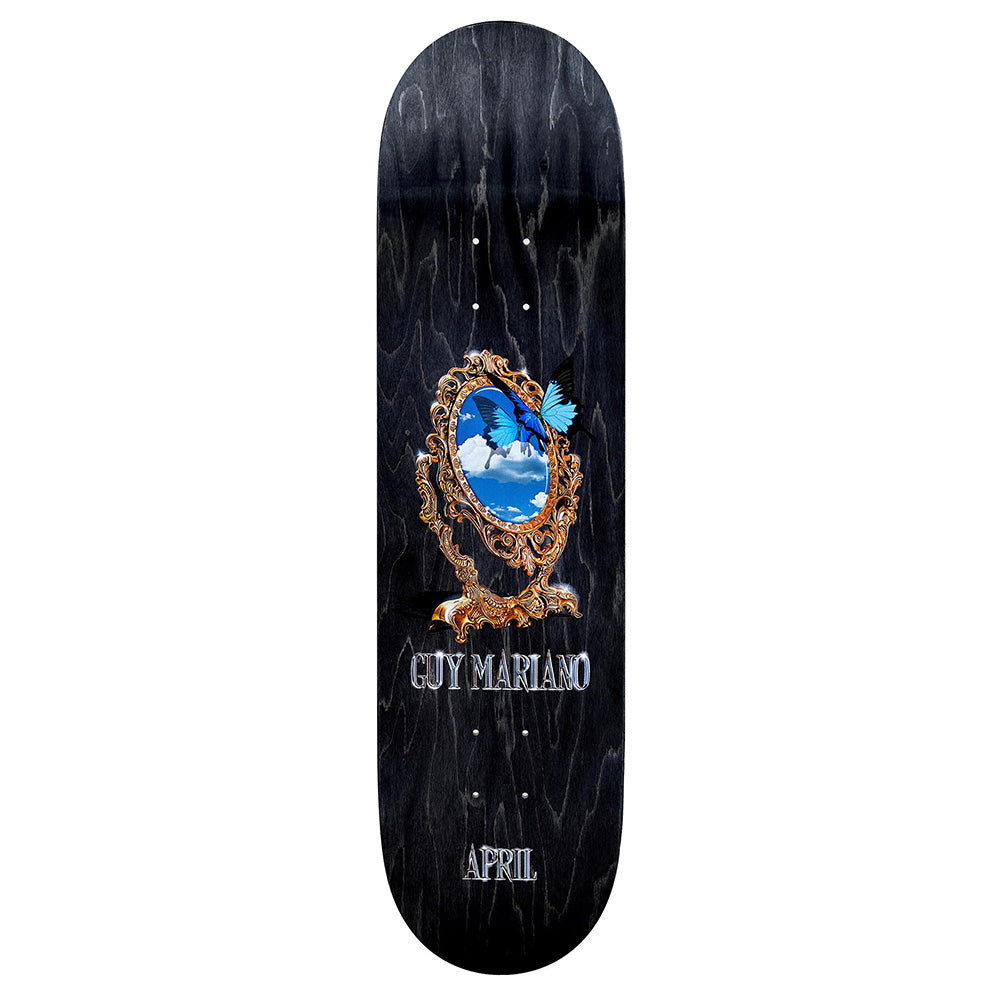 The APRIL GUY MARIANO MIRROR MIRROR 2 deck features a black base with a gold mirror design, reflecting a sky and subtle BLUE MACAW nod—ideal for skateboarders and APRIL fans, especially those of Guy Mariano and Rayssa Leal.