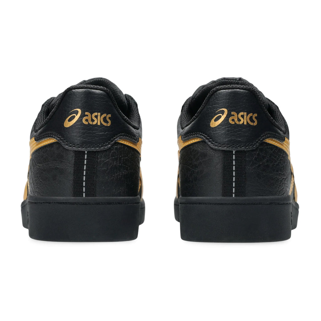 The image features ASICS JAPAN PRO BLACK / PURE GOLD sneakers, highlighting their durability and displaying the iconic brand logo on the heels from a rear view.