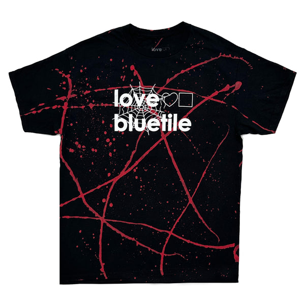 A BLUETILE "LOVE BLUETILE HALLOWEEN" tee with black / red splatters on it from Bluetile Skateboards.