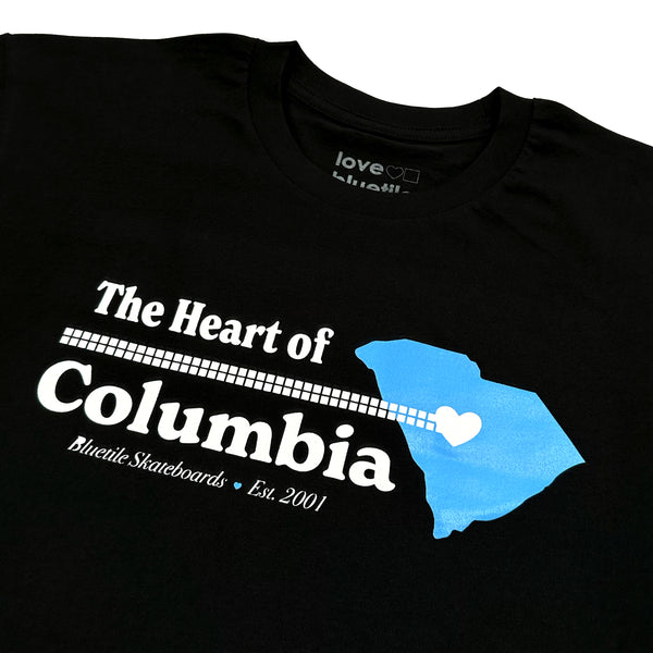 The black BLUETILE HEART OF COLUMBIA TEE BLACK featuring the iconic Blue Tile logo at the heart.