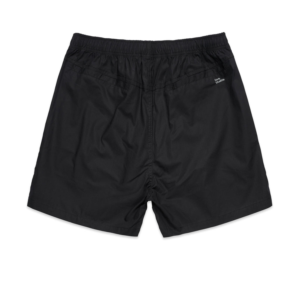 The BLUETILE SURPLUS V3 BEACH SHORT BLACK from Bluetile Skateboards features an elastic waistband and a discreet logo on the back right side, making it perfect for beach outings.