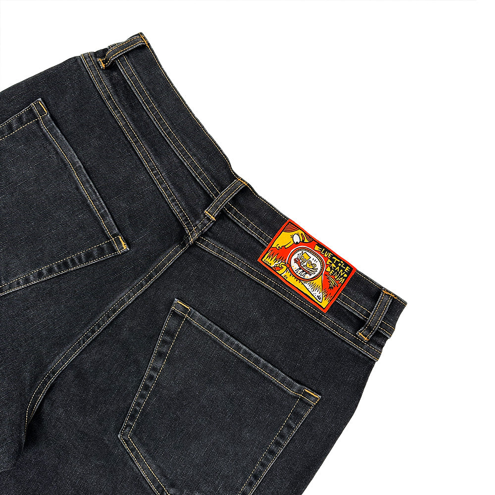 BLUETILE BRAND DENIM RUTLEDGE SHORTS BLACK by Bluetile Skateboards shown from the back, feature two rear pockets, a colorful rectangular waistband patch, and a loose fit for a relaxed, casual denim shorts style.