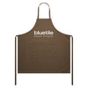 The BLUETILE PRINT STUDIO CANVAS APRON WALNUT by Bluetile Skateboards features a neck loop, adjustable strap, waist ties, and a central pocket for convenience. Crafted from 100% cotton, it offers both comfort and durability, with "bluetile PRINT STUDIO" printed on the front.