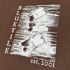 A BLUETILE "RAZORS" TEE DARK CHOCOLATE with the words Bluetile Skateboards on it.