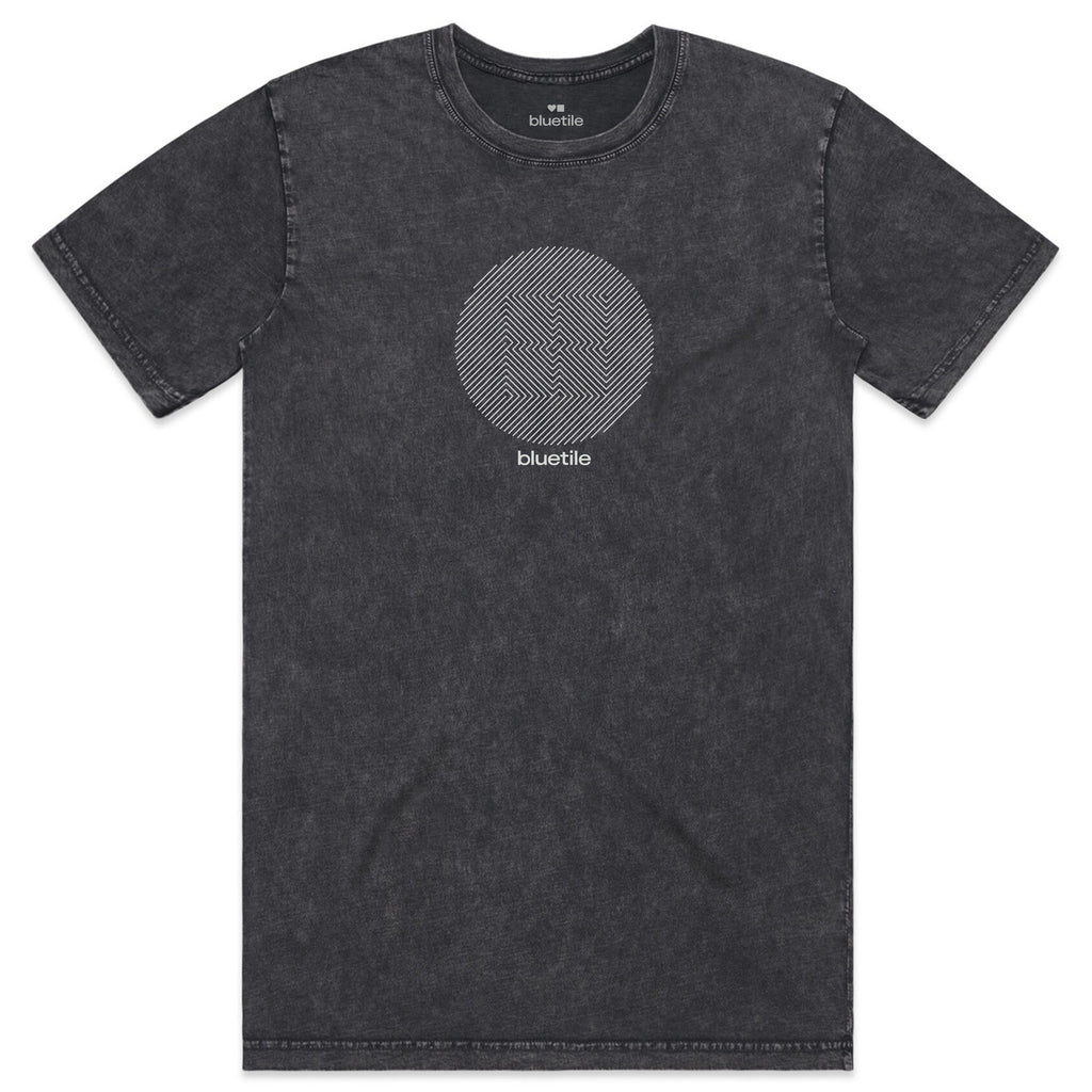 A "CRAZY" silver foil stone washed tee by Bluetile Skateboards, made from soft combed cotton and showcasing a circular patterned design with bold "BLUETILE" text on the front, in black.